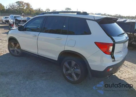 2021 Honda Passport 2Wd Touring z USA, uszkodzony, nr VIN 5FNYF7H96MB012397
